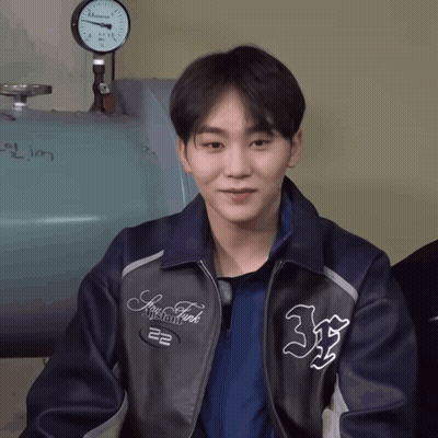 A Young Man Wearing A Jacket That Says New York GIF
