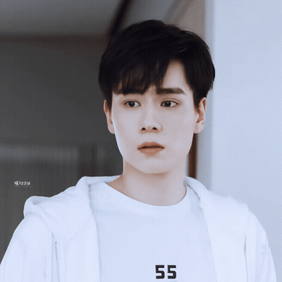 A Young Man Wearing A White Shirt That Says 55 GIF