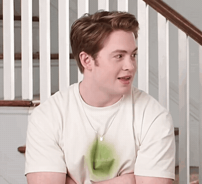 A Young Man Wearing A White T-Shirt That Says Real Fresh GIF