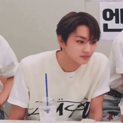 A Young Man Wearing A White Vest And A White T-Shirt With The Number 19 On It GIF