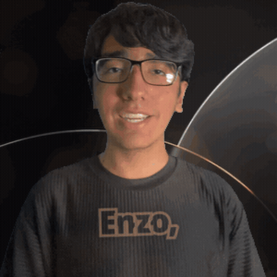 A Young Man Wearing Glasses And A Shirt That Says Enzo On It GIF
