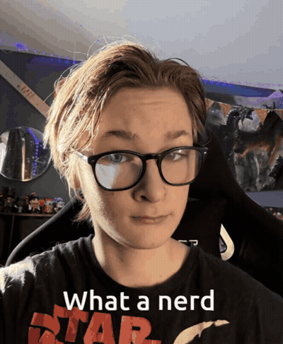 A Young Man Wearing Glasses And A Star Wars Shirt Says " What A Nerd " GIF
