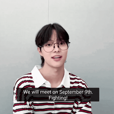 A Young Man Wearing Glasses And A Striped Shirt Says " We Will Meet On September 9Th Fighting " GIF