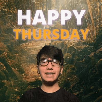 A Young Man Wearing Glasses Is Smiling In Front Of A Happy Thursday Sign GIF