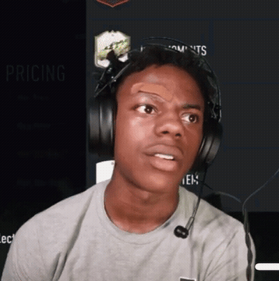 A Young Man Wearing Headphones And A Bandage On His Eyebrow . GIF