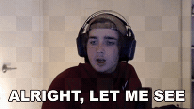 A Young Man Wearing Headphones And A Hat Says Alright Let Me See GIF