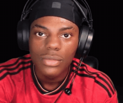 A Young Man Wearing Headphones And A Headband Is Making A Funny Face . GIF