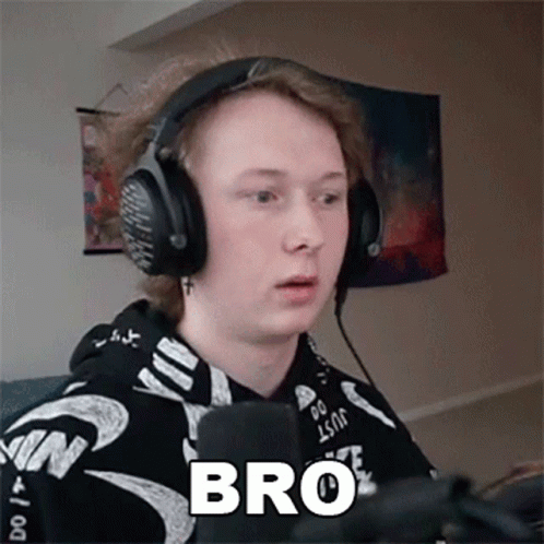 Young Man With Headphones Sitting In Front Of Microphone GIF