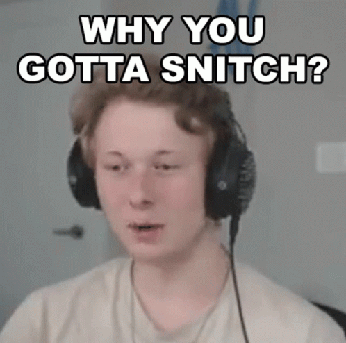 A Young Man Wearing Headphones Is Making A Funny Face . GIF
