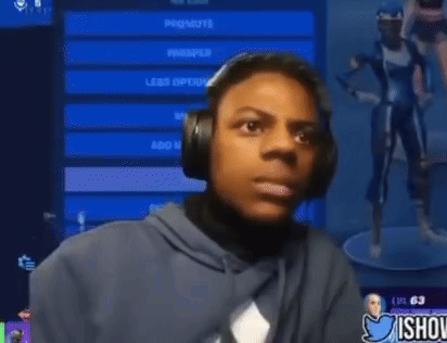 A Young Man Wearing Headphones Is Smiling In Front Of A Screen That Says " Promote " GIF