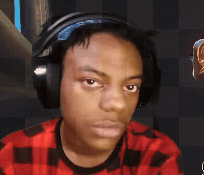 A Young Man Wearing Headphones Looks At The Camera GIF