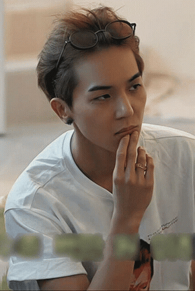 A Young Man Wearing Sunglasses And A T-Shirt That Says ' Devil ' On It GIF