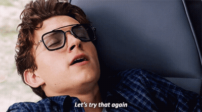 A Young Man Wearing Sunglasses Is Laying Down And Says Let 'S Try That Again GIF