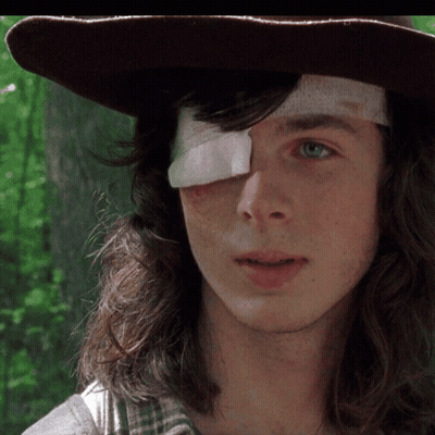 A Young Man With A Bandage On His Eye GIF