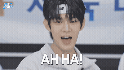 A Young Man With A Headband That Says Ah Ha GIF