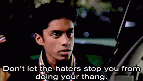 A Young Man With A Medal Around His Neck Says " Don 'T Let The Haters Stop You From Doing Your Thang " GIF
