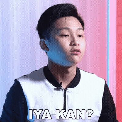 A Young Man With A Microphone In His Ear Says Iya Kan GIF