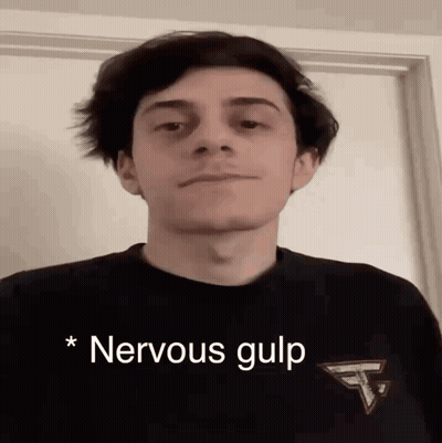 A Young Man With A Nervous Gulp On His Shirt GIF
