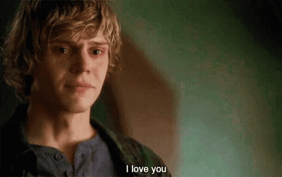 A Young Man With Blonde Hair Is Crying And Says `` I Love You '' . GIF