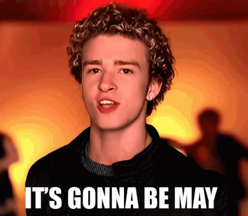 A Young Man With Curly Hair Has The Words " It 'S Gonna Be May " On His Face GIF