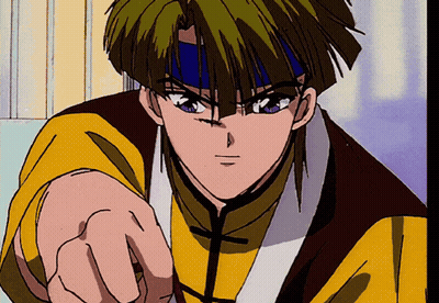 A Young Man With Green Hair And A Blue Headband Points At The Camera GIF