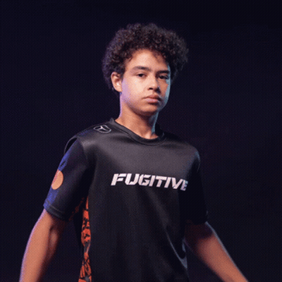 A Young Man With His Arms Crossed Is Wearing A Shirt That Says Ativ GIF