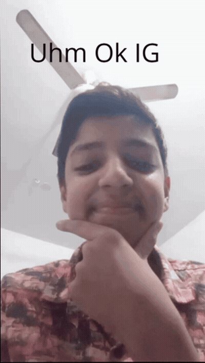 A Young Man With His Hand On His Chin And The Words Uhm Ok Ig Written Above Him GIF