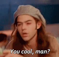 A Young Man With Long Hair Is Wearing A Hat And Says `` You Cool Man ? '' GIF