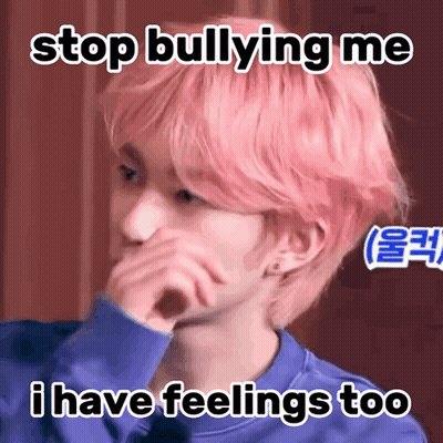 A Young Man With Pink Hair Is Covering His Face With His Hand And A Meme Says Stop Bullying Me I Have Feelings Too GIF