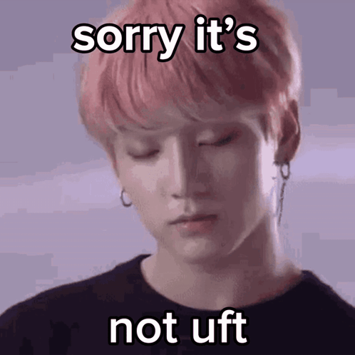 A Young Man With Pink Hair Is Making A Funny Face And Says Sorry It 'S Not Uft . GIF