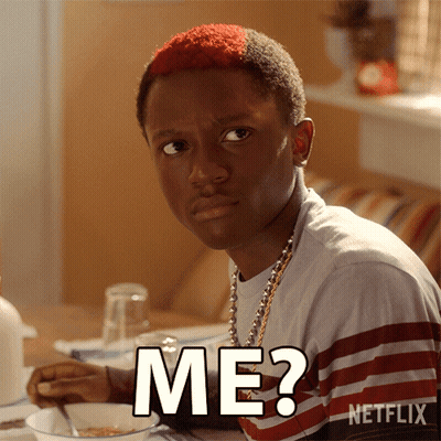 A Young Man With Red Hair Is Sitting At A Table With A Netflix Logo In The Corner GIF