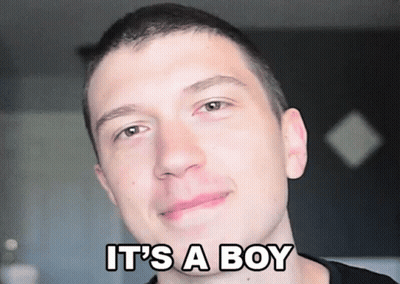 A Young Man With The Words It 'S A Boy Written On His Face GIF