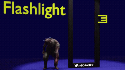 A Zombie Is Standing In Front Of A Flashlight GIF