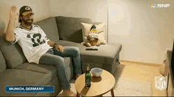 Aaron Rodgers Waving Hand GIF