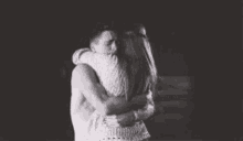 Abrazos A Couple's Strong Embrace GIF