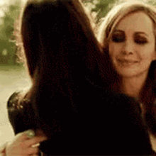 Abrazos Women Hugging Each Other GIF