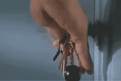 Ace Ventura Unlocking Door Knob GIF