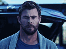 Actor Chris Hemsworth Sighed And Walked GIF
