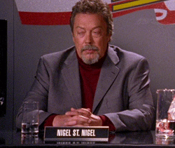 Actor Tim Curry Disgusted And Having Headache Reaction GIF