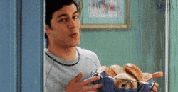 Adam Brody Carrying Basket Of Bagel GIF