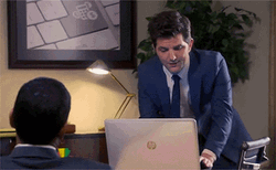 Adam Scott Closing His Laptop GIF
