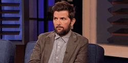 Adam Scott Looking Around GIF