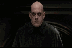 Addams Family Uncle Fester Serious Stare GIF