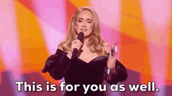 Adele Dedicates Her Trophy To Someone GIF