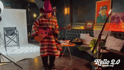 Adele Hello Boy Playing Guitar Wearing Hat GIF