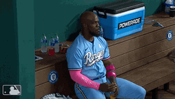 Adolis Garcia Chest Thump And Peace Sign GIF