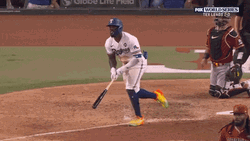 Adolis Garcia Throwing Bat While Running GIF