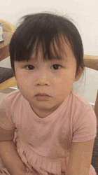 Adorable Asian Kid Eyebrow Twitch GIF