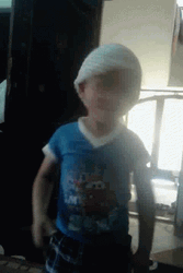 Adorable Kid Shaking Head No GIF