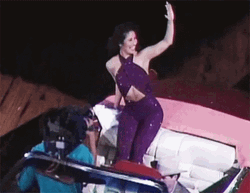 Adorable Selena Quintanilla Waving GIF